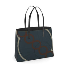 Load image into Gallery viewer, Black tote bag with decorative elements on a white background