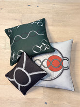Load image into Gallery viewer, Three decorative pillows with unique patterns on a wooden surface
