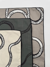 Load image into Gallery viewer, Decorative pillow with snake pattern on a beige background