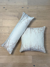 Load image into Gallery viewer, Two decorative pillows with a branch pattern on a wooden floor.
