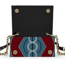 Load image into Gallery viewer, Handbag with geometric design and gold chain strap on a white background