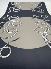 Load image into Gallery viewer, Decorative rug with abstract patterns on a dark background