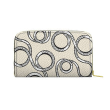 Load image into Gallery viewer, Beige wallet with black spiral pattern on a white background
