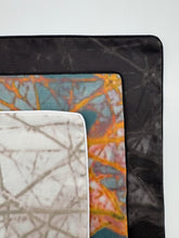 Load image into Gallery viewer, Three fabric swatches with abstract patterns on a white background
