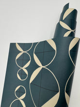 Load image into Gallery viewer, Roll of dark blue wallpaper with beige geometric pattern on a light gray background
