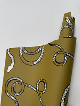 Load image into Gallery viewer, Roll of decorative paper with rope pattern on a white background
