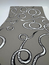 Load image into Gallery viewer, Yoga mat with snake design on a gray background
