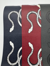 Load image into Gallery viewer, Three neckties with snake pattern design on a white background

