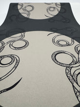 Load image into Gallery viewer, Yoga mat with black abstract patterns on a gray background
